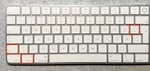 Tastenkombination Option + Shift + Plus auf einer Mac-Tastatur.
