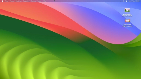 Bildschirmfotos auf dem Mac Schreibtisch angeordnet