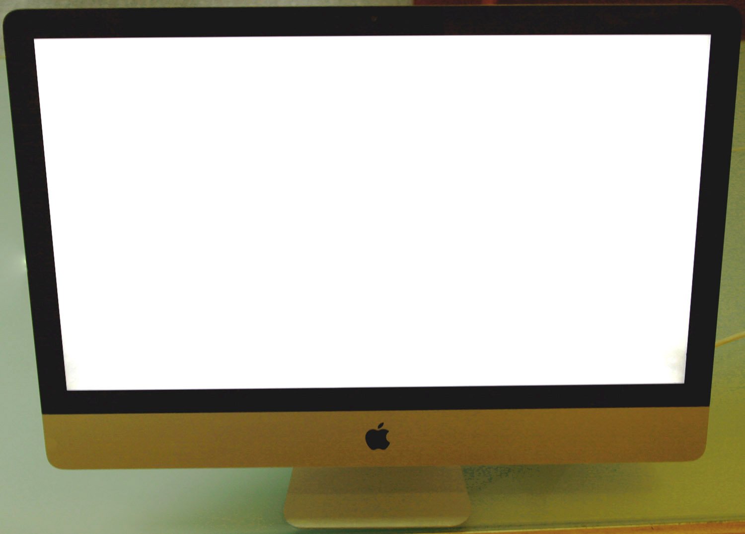 Ein iMac-Display ist beim Hochfahren im Startbildschirm eingefroren. Der Bildschirm ist weiß, der Ball dreht sich nicht mehr bzw der Ladebalken